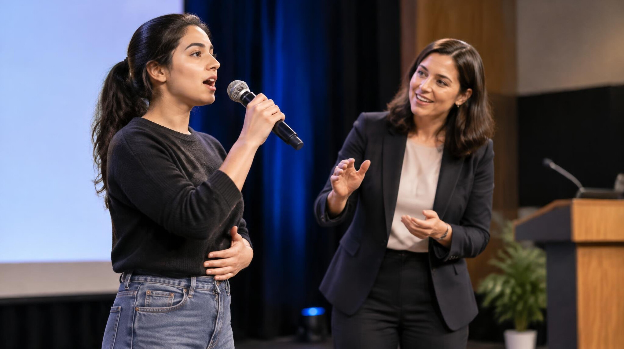 person practicing voice exercises on stage